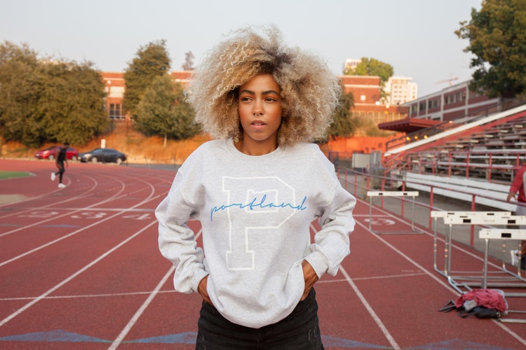 woman standing on track