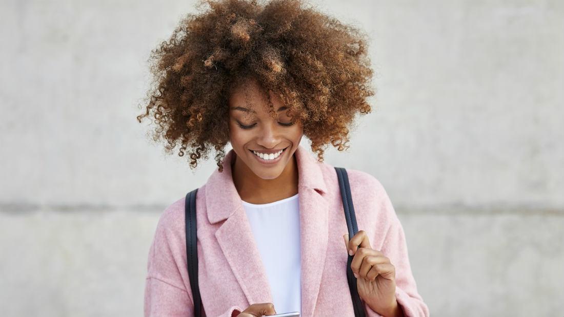 blogger with a pink jacket